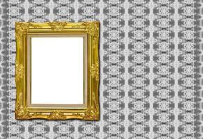 antique golden picture frame on fabric texture photo