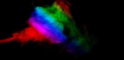 Abstract smoke isolated on black background,Rainbow powder photo