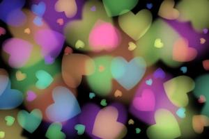 Abstract colorful heart isolated on black background photo