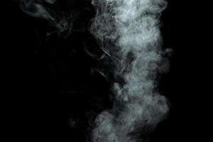 Abstract powder or smoke isolated on black background photo