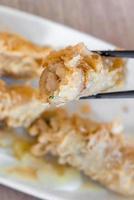 Fried shrimp roll - Taiwanese food cuisine in Tainan, Taiwan restaurant, close up, lifestyle. photo