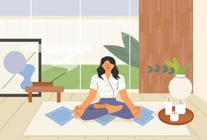 A woman is sitting in the living room and meditating. flat design style vector illustration.