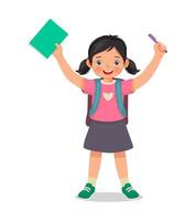 niña feliz estudiante con mochila sosteniendo un libro y un bolígrafo sintiéndose emocionada de volver a la escuela vector