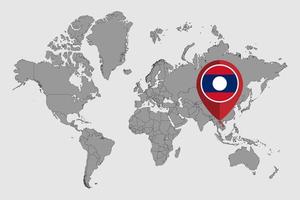 pin mapa con la bandera de laos en el mapa mundial. ilustración vectorial vector