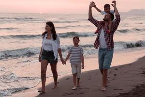 Family have fun and live healthy lifestyle on beach. Selective focus photo