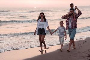 Family have fun and live healthy lifestyle on beach. Selective focus photo