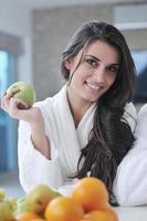 young couple have fun in modern kitchen photo