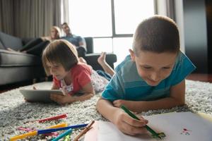 young couple spending time with kids photo