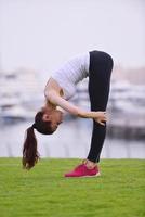 Young beautiful  woman jogging  on morning photo