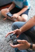 Happy family playing a video game photo