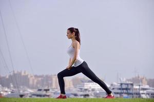 Young beautiful  woman jogging  on morning photo