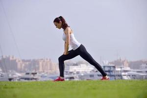 Young beautiful  woman jogging  on morning photo