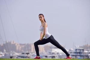 Young beautiful  woman jogging  on morning photo