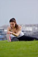 Young beautiful  woman jogging  on morning photo