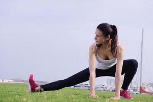 Young beautiful  woman jogging  on morning photo