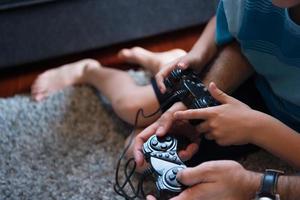 Happy family playing a video game photo