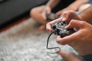 Happy family playing a video game photo