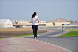 woman jogging at morning photo