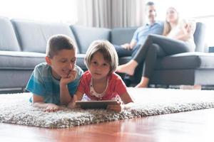 couple spending time with kids photo