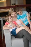 Young Family Using A Tablet To Make Future Plans photo