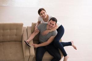 couple relaxing at  home with tablet computers photo