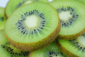 beautiful kiwi fruit slices background photo