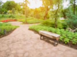 blur bench in the park summer time natural background photo