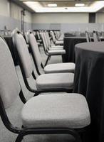 Rows of empty rooms in a big conference room photo