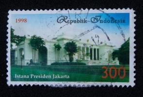 sidoarjo, jawa timur, indonesia, 2022 - filatelia, una colección de sellos con el tema del palacio presidencial en jakarta foto