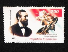 Sidoarjo, Jawa timur, Indonesia, 2022 - Philatelic stamp collection with an illustration of a man named Heinrich von Stephan photo