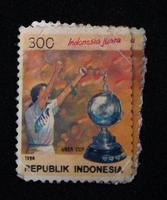 Sidoarjo, Jawa timur, Indonesia, 2022 - Stamp collection philately with the theme of the Uber Cup trophy illustration photo