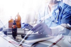 Double exposure of technology healthcare And Medicine concept. Two doctors using digital tablet and modern virtual screen interface icons panoramic banner, blurred background. photo
