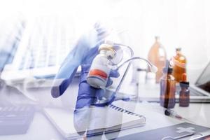 Double exposure of technology healthcare And Medicine concept. Two doctors using digital tablet and modern virtual screen interface icons panoramic banner, blurred background. photo