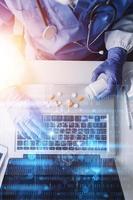 Double exposure of technology healthcare And Medicine concept. Two doctors using digital tablet and modern virtual screen interface icons panoramic banner, blurred background. photo