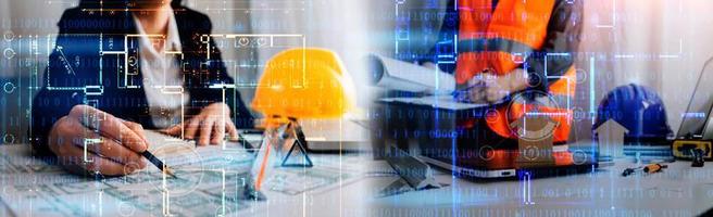 Two colleagues discussing data working and tablet, laptop with on on architectural project at construction site at desk in office photo