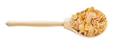 wooden spoon with sugar coated cornflakes isolated photo