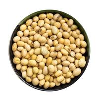 raw dried soybeans in round bowl isolated photo