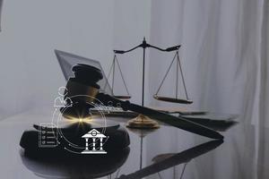 justice and law concept.Male judge in a courtroom on wooden table and Counselor or Male lawyer working in office. Legal law, advice and justice concept. photo