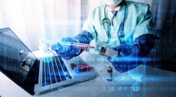 Medicine doctor hand working on a patients x-ray scans digital healthcare and connection with modern virtual screen interface icons, Medical technology and network concept. photo