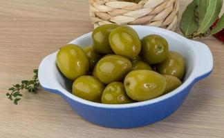 Marinated green olives photo