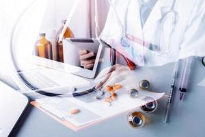 Double exposure of technology healthcare And Medicine concept. Two doctors using digital tablet and modern virtual screen interface icons panoramic banner, blurred background. photo