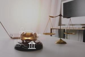 Business and lawyers discussing contract papers with brass scale on desk in office. Law, legal services, advice, justice and law concept picture with film grain effect photo
