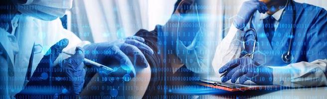 Medicine doctor hand working on a patients x-ray scans digital healthcare and connection with modern virtual screen interface icons, Medical technology and network concept. photo