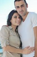 couple relaxing on balcony photo