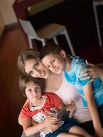 Young Family Using A Tablet To Make Future Plans photo