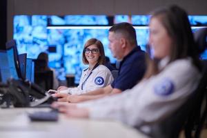 Group of Security data center operators at work photo