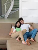 young couple making selfie together at home photo