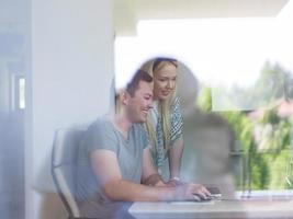 man and woman operators of security systems photo