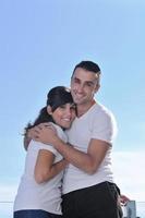 couple relaxing on balcony photo