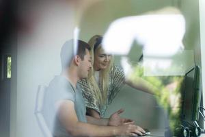 man and woman operators of security systems photo